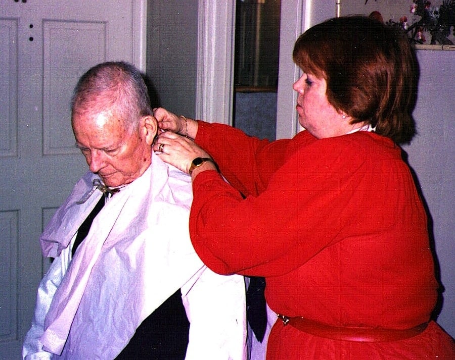 W. Edwards Deming receiving a haircut from his daughter Linda