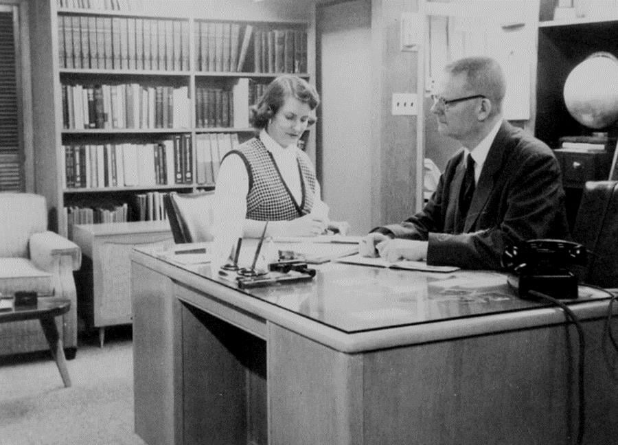 W. Edwards Deming at his desk with secretary Cecelia Kilian